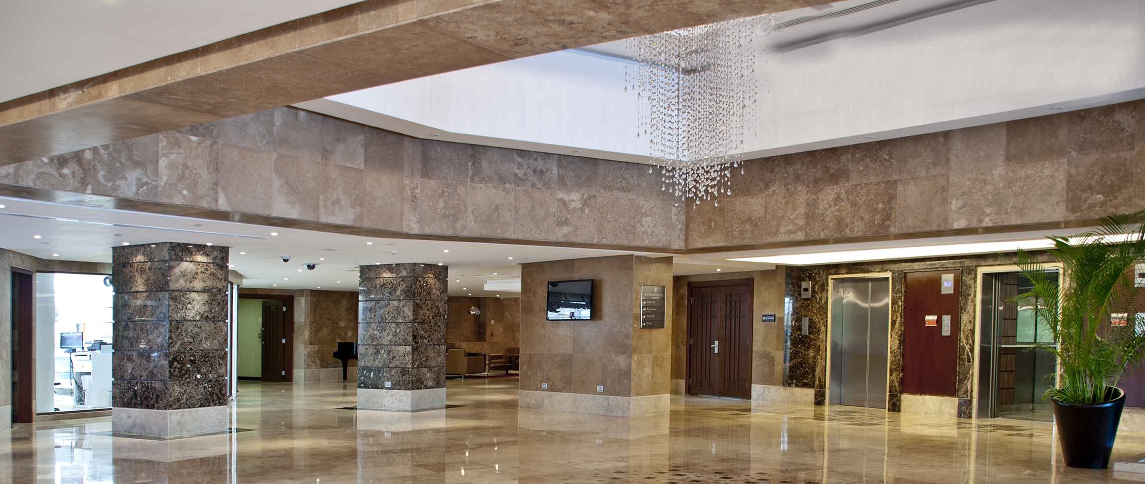 NOCE HOTEL FLOORING TRAVERTINE